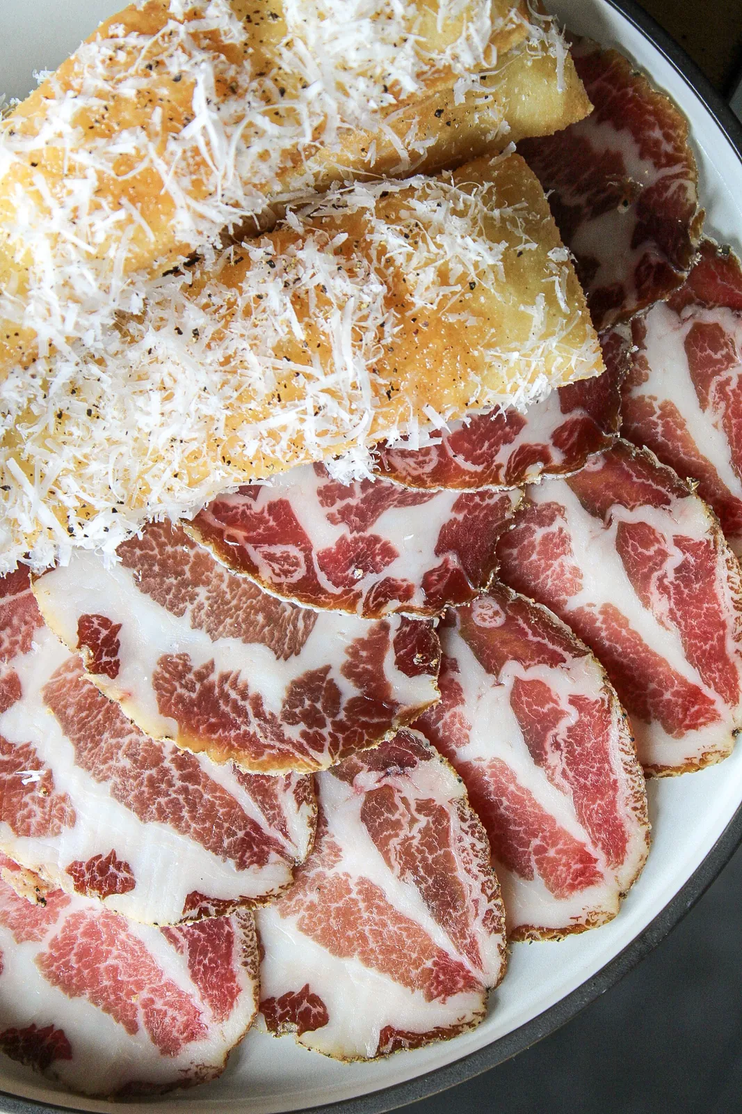 Thinly sliced coppa salumi