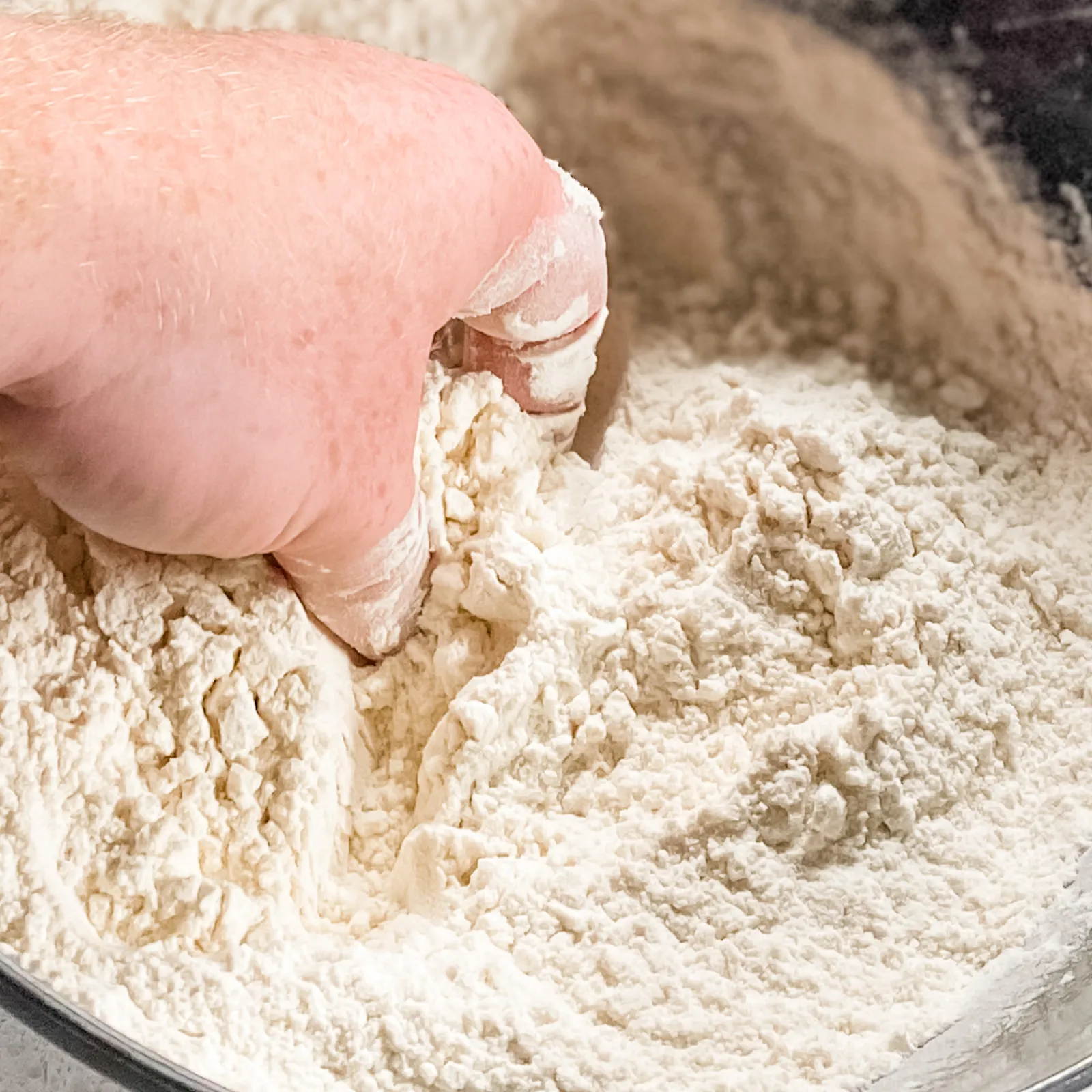 Chef Devin's hand in flour