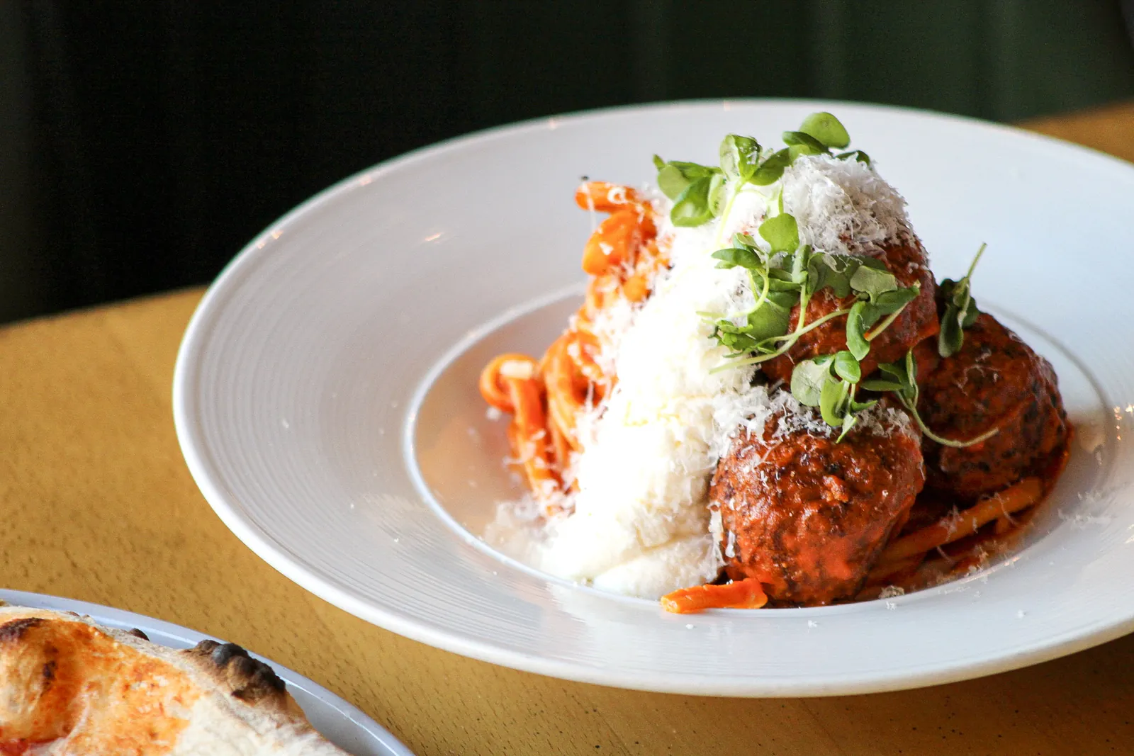 Meatballs with tomato and whipped ricotta